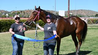 Holly-Marie boogieing to the races